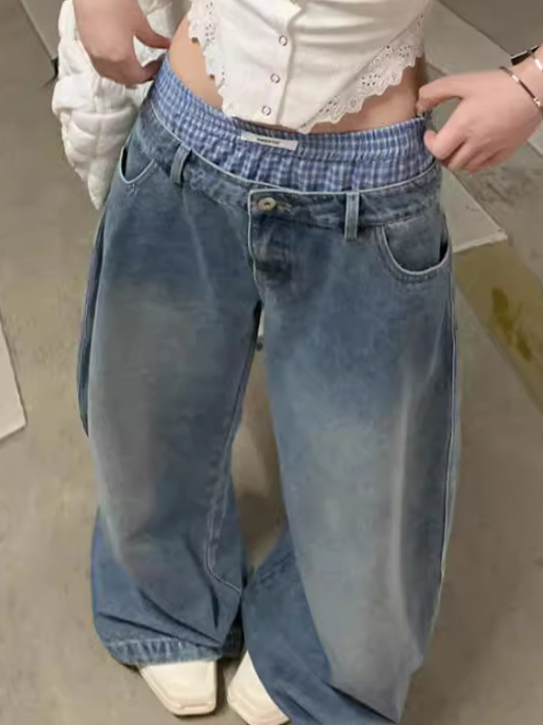 Vaqueros boyfriend de pernera ancha y lavados con cintura doble diseñados
