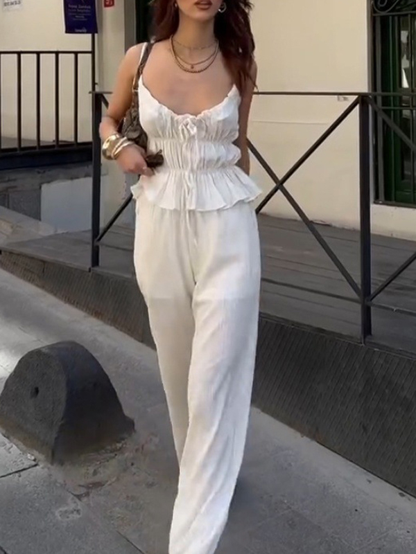 Traje de dos piezas con pliegues prensados y adelgazantes