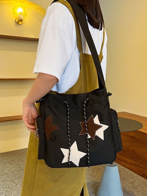 Bolso de lona con estampado de estrellas en contraste