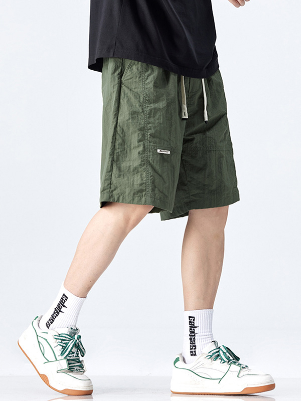 Pantalones cortos de seda Lce sueltos casuales de color sólido para hombre